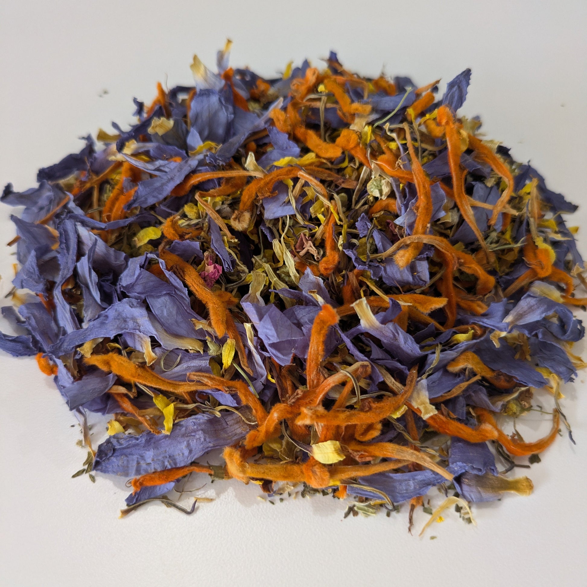 wild dagga, blue lotus, chamomile tea blend subtle euphoria by astral herbal on a white background.
