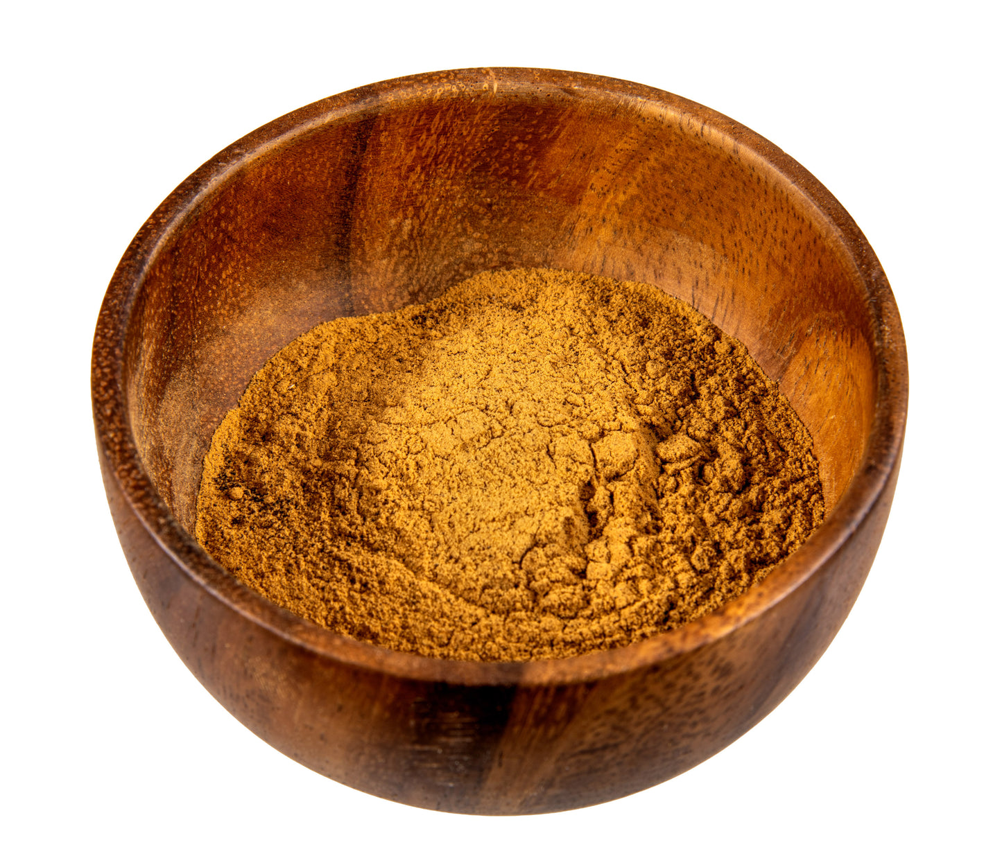 Wooden bowl filled with brown powder on a white background