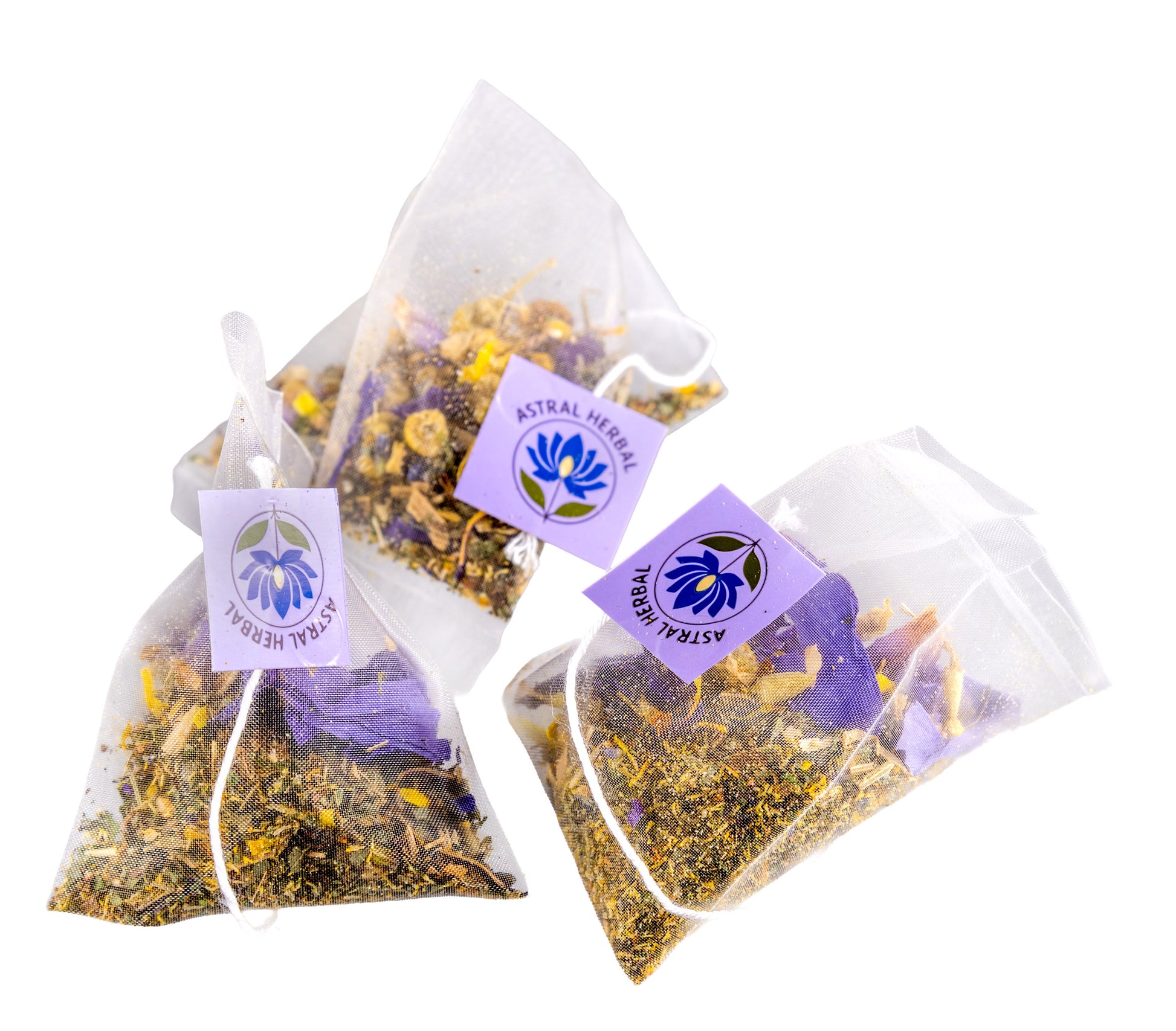 Three bags of dried herbs with an Astral Herbal label on a white background