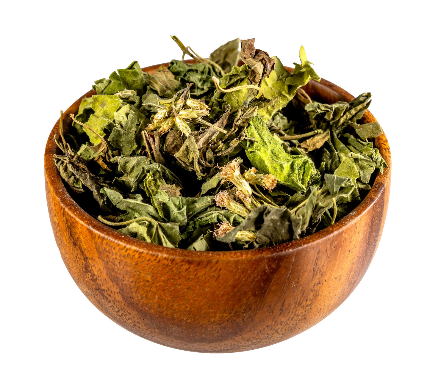 Wooden bowl filled with green dried leaves on a white background