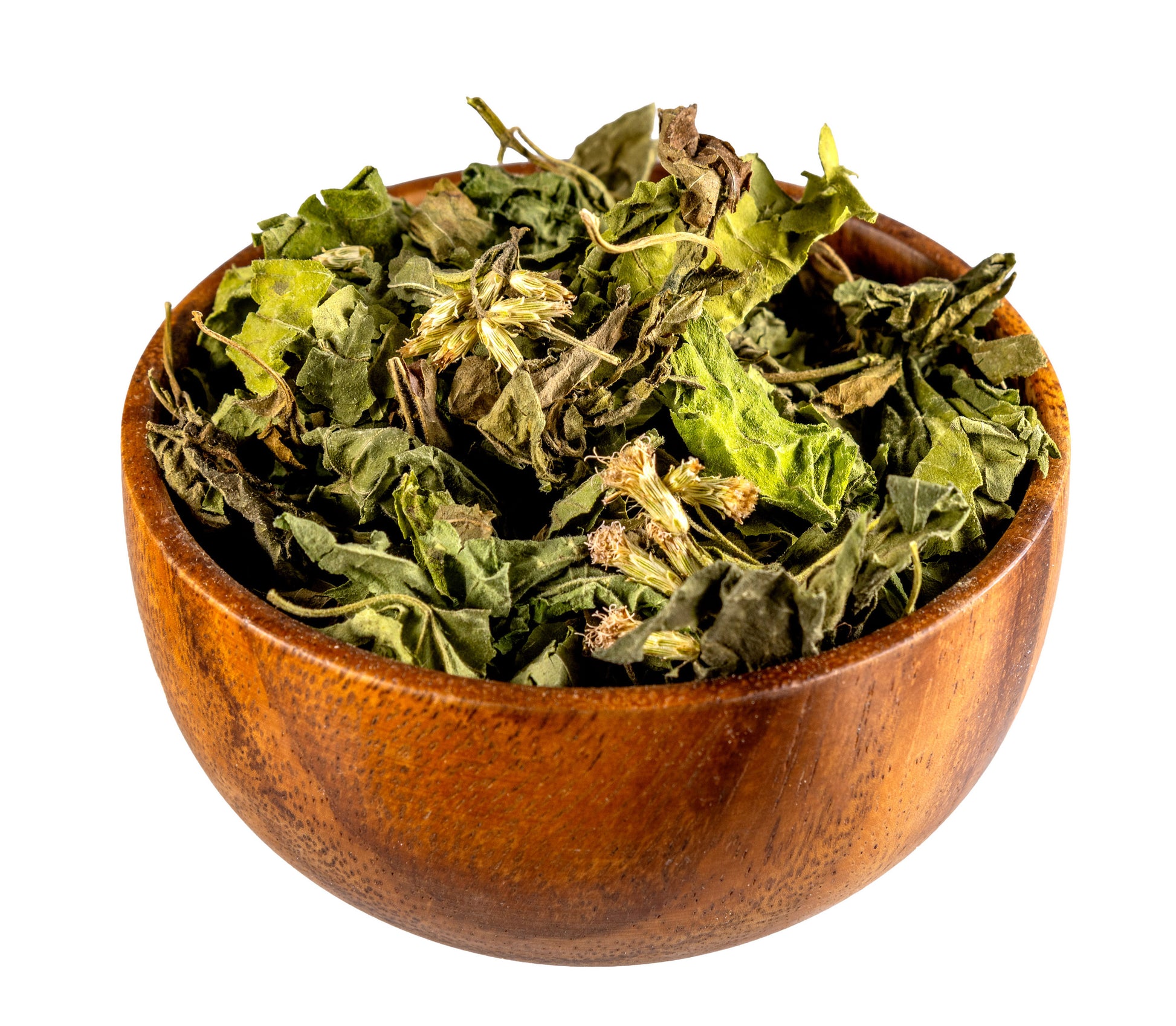 Wooden bowl filled with green dried leaves on a white background